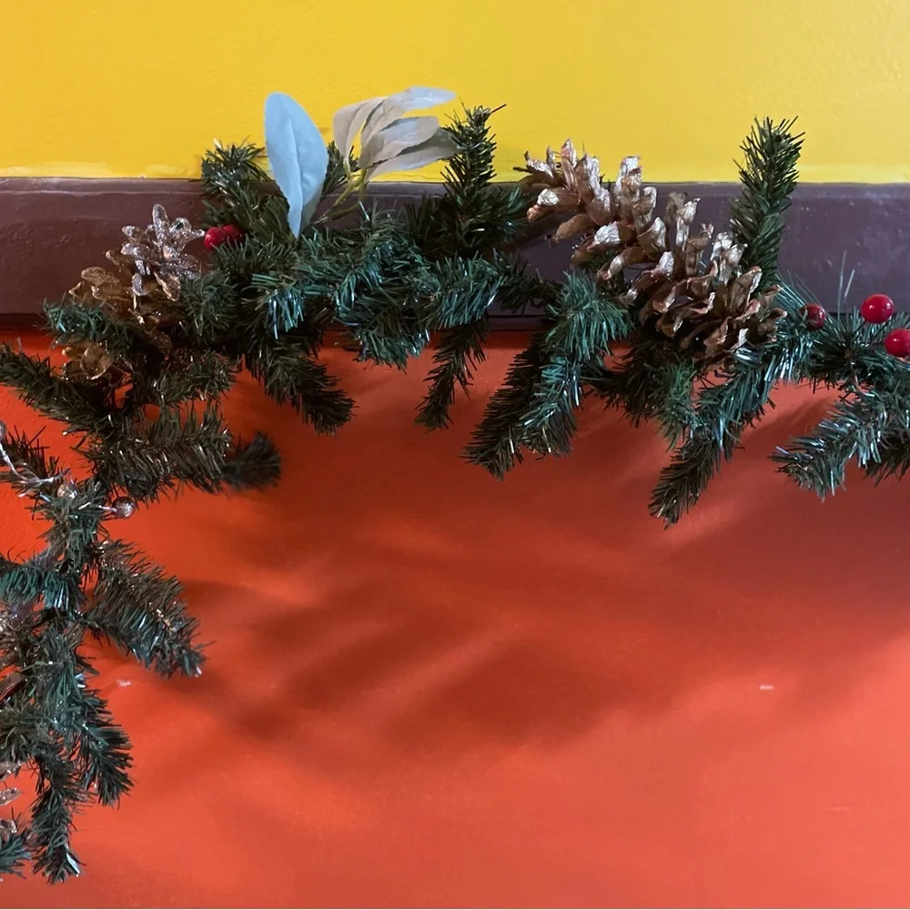 9 foot gold and silver faux evergreen garland, pine cones, berries